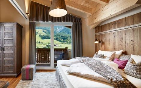 Bett im Penthouse Pinzgauer Bett im Penthouse Pinzgauer